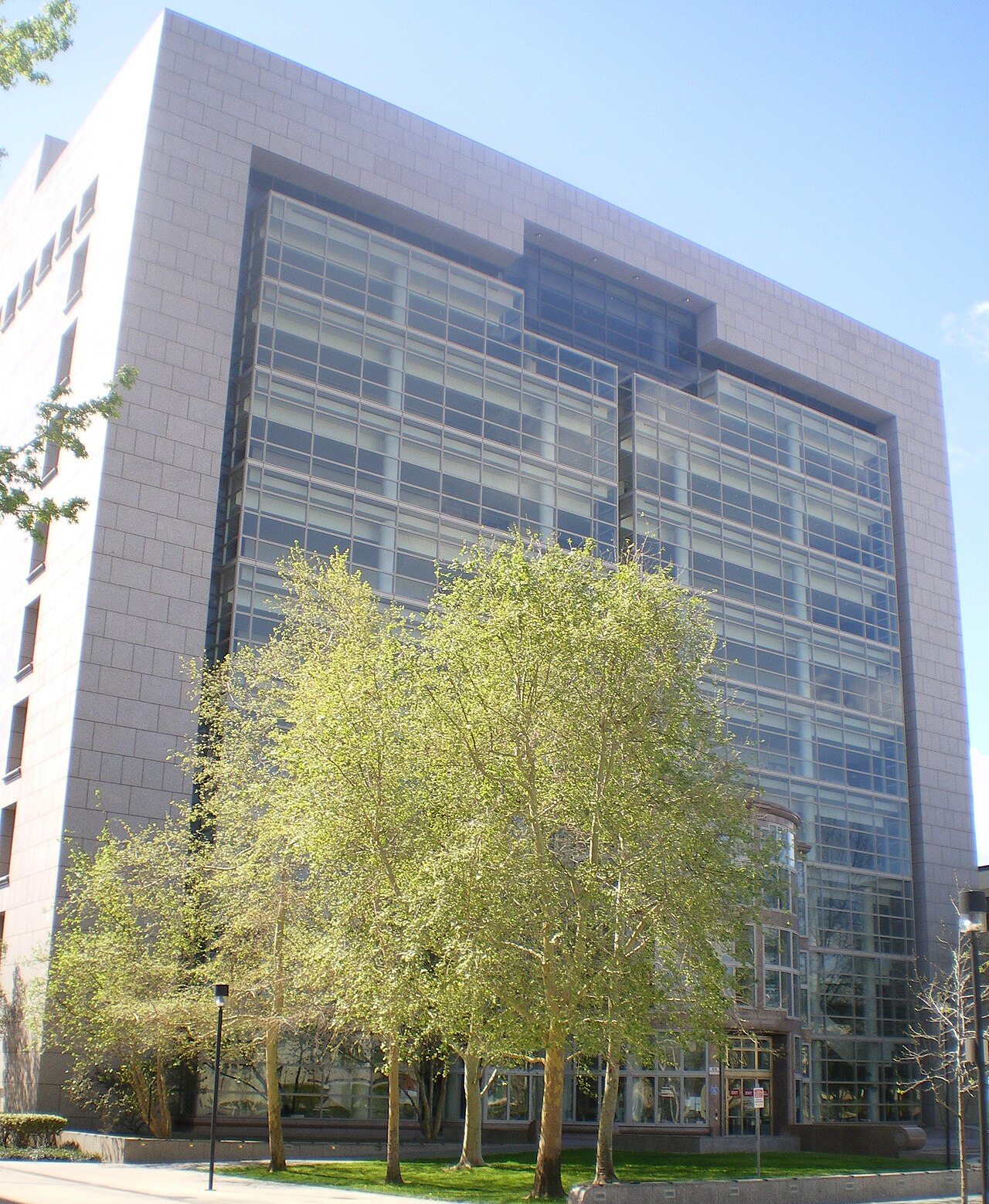 Van Nuys Courthouse rising behind leafy trees in a March 2008 photograph.